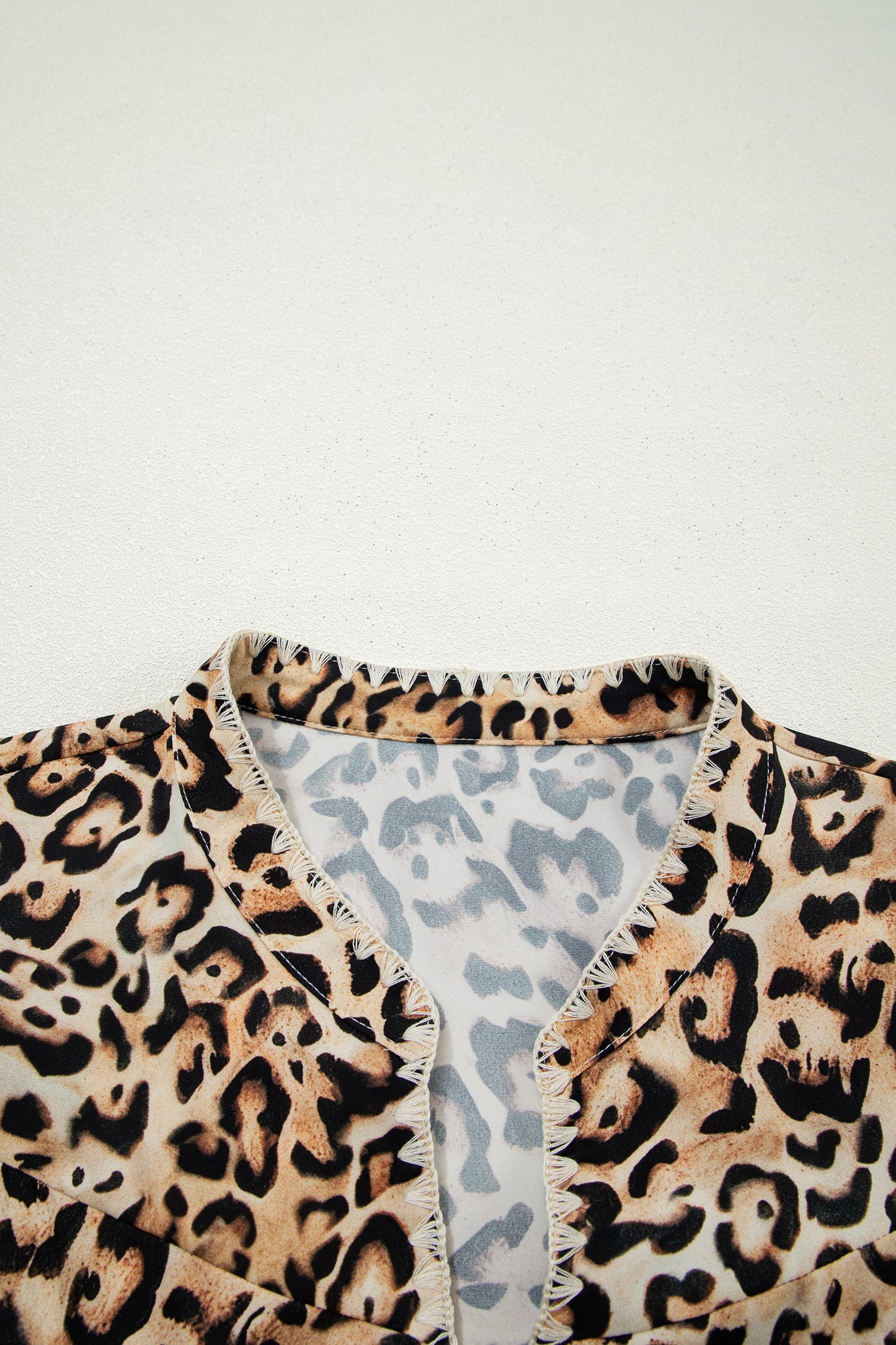 Untamed Charm Leopard Ruffle Blouse
