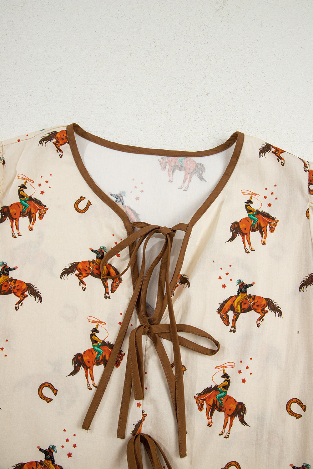 Wild Bronco Bow Peplum Blouse