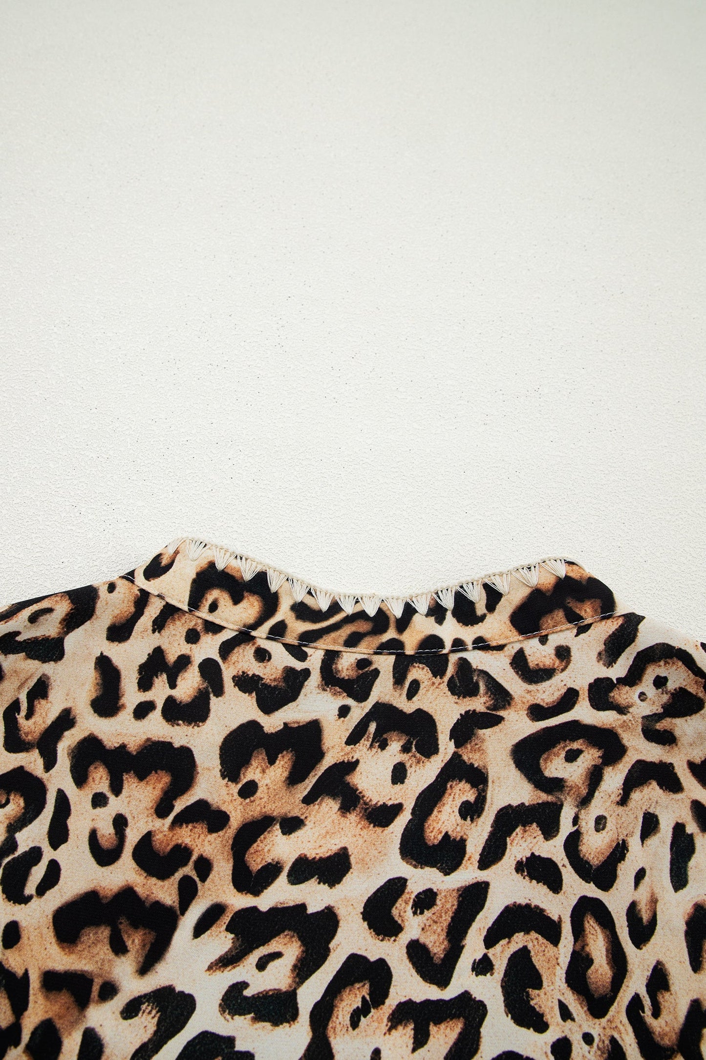 Untamed Charm Leopard Ruffle Blouse