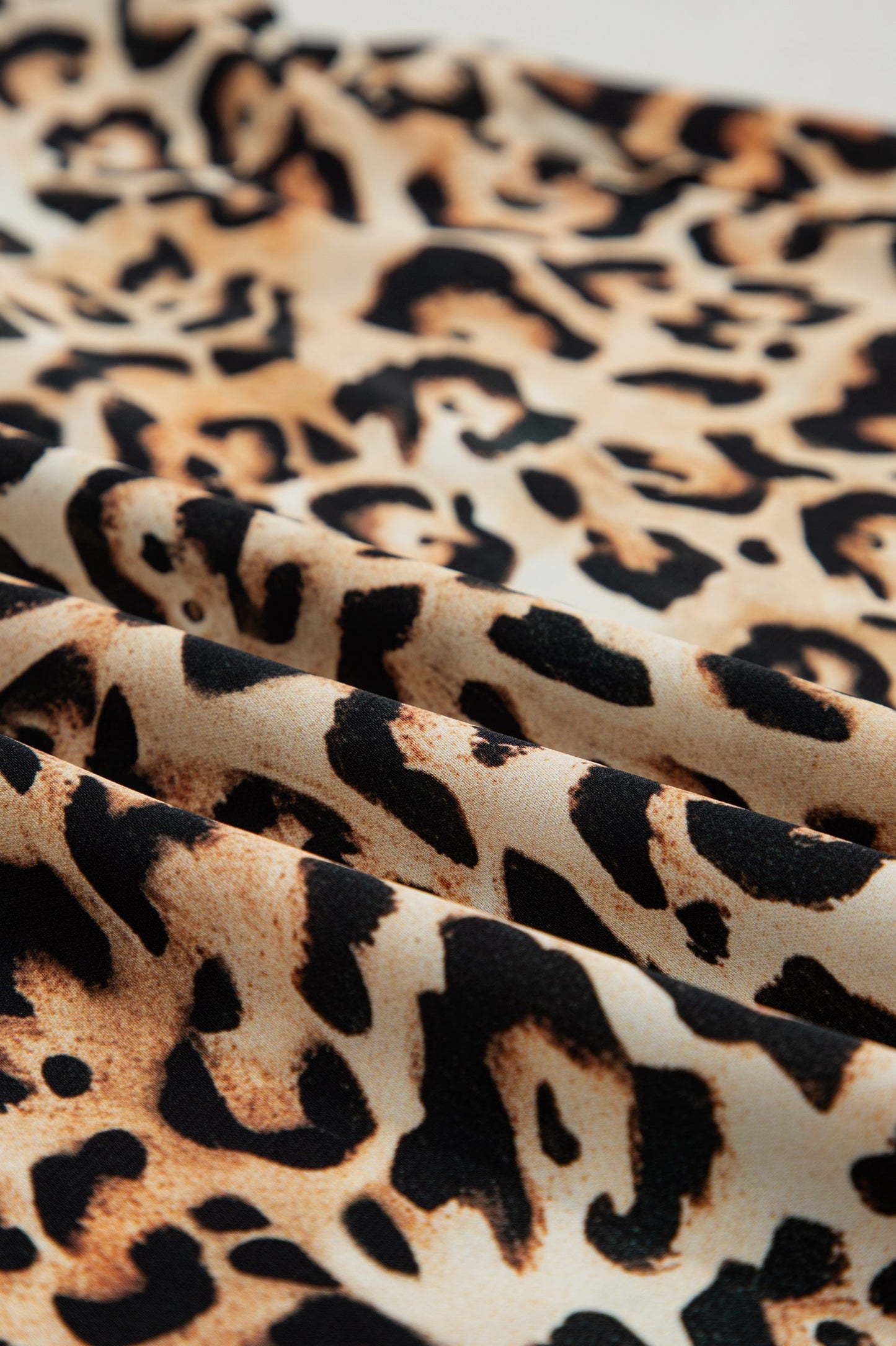 Untamed Charm Leopard Ruffle Blouse