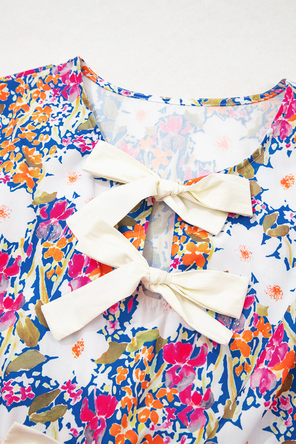 Wildflower Bow Peplum Blouse
