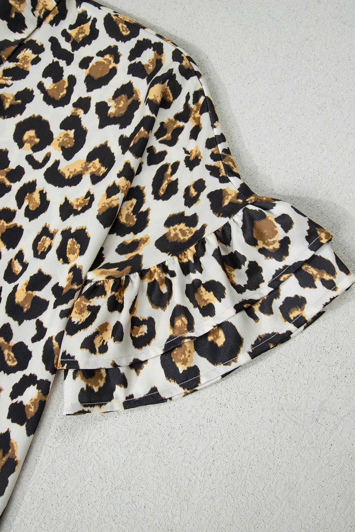 Untamed Charm Leopard Ruffle Blouse