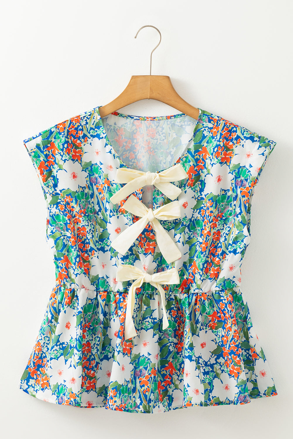 Wildflower Bow Peplum Blouse