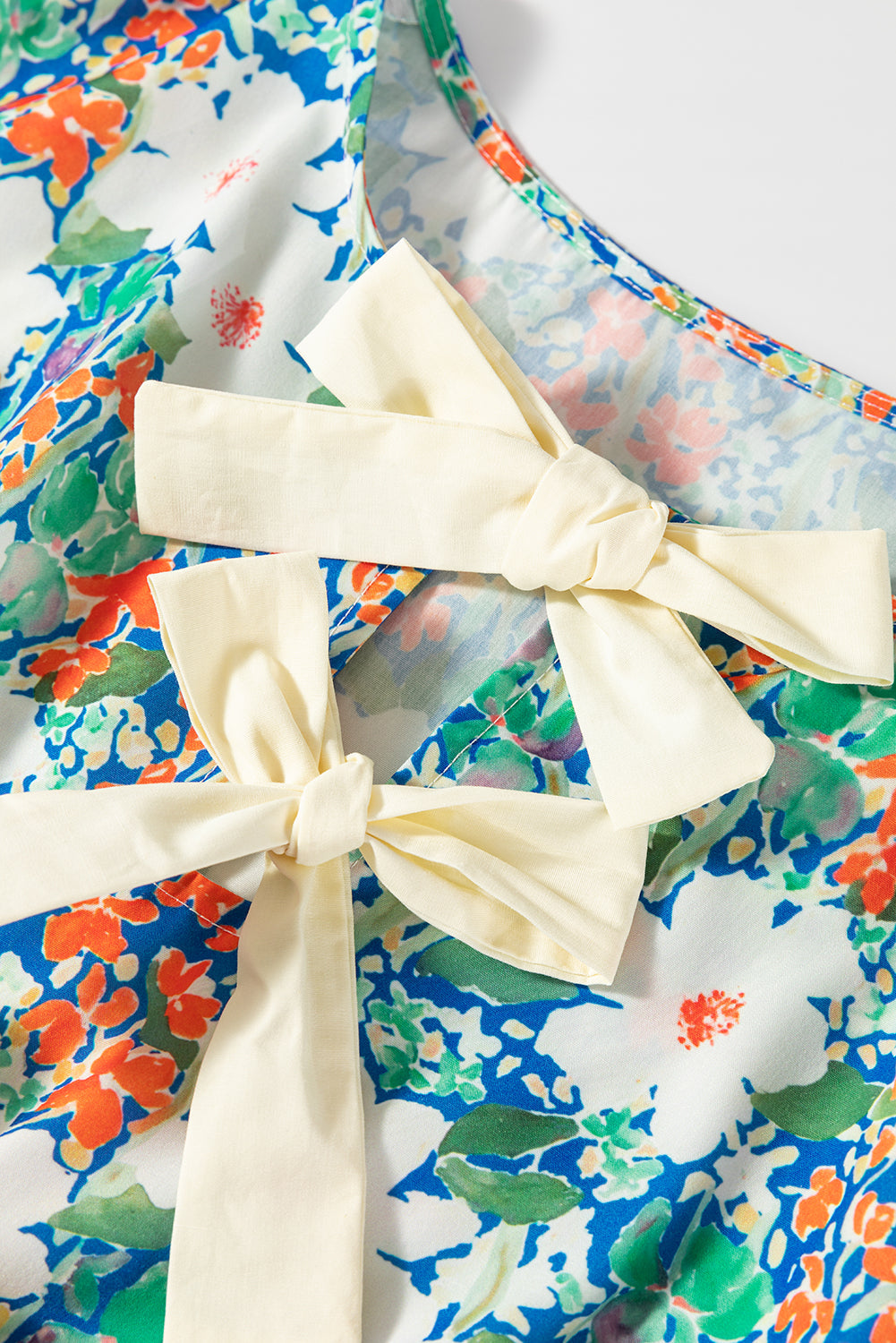 Wildflower Bow Peplum Blouse